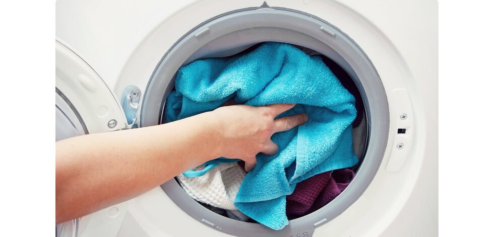 Giặt không đúng khối lượng quy định của máy